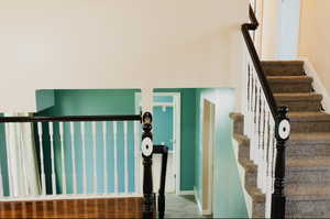 Staircase with wood-type flooring