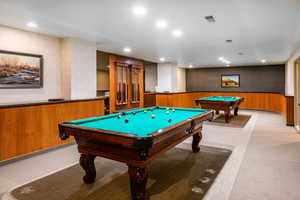 Billiards room with two tables