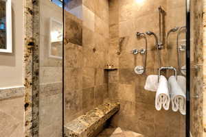 Bathroom with a tile shower