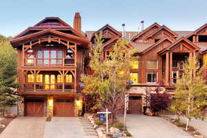 View of front facade featuring a garage