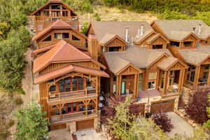 View of front of home featuring a balcony