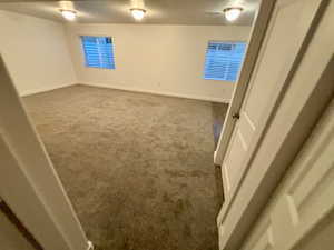 Interior space featuring carpet floors