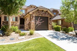 View of front of property with a garage