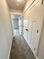 Hall featuring carpet