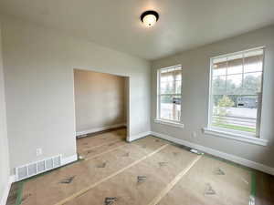 Unfurnished bedroom with baseboards