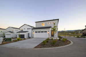 View of front of house with a garage