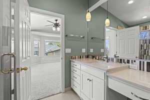 Full bathroom featuring vanity, a ceiling fan, a healthy amount of sunlight, and recessed lighting