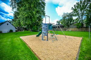 View of jungle gym featuring a yard