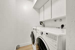 Laundry room with washing machine and dryer