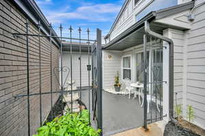 View of gated front patio / terrace