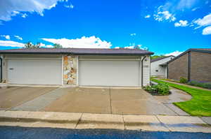 View of front facade featuring a 2 car garage