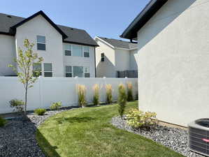 View of yard featuring central AC unit