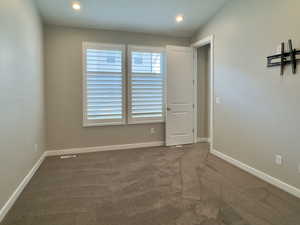 View of carpeted spare room