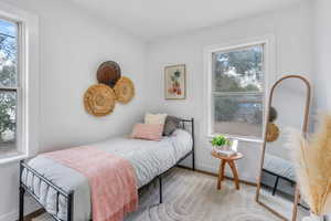 Bedroom 2 featuring multiple windows