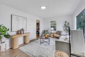 Living room with wood-style flooring