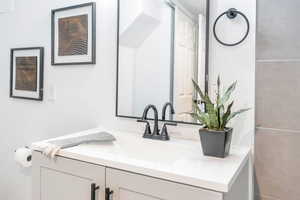 Downstairs Bathroom with vanity