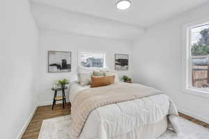 Bedroom 1 with light wood-type flooring