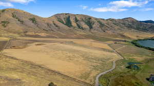 Property view of mountains with a rural view