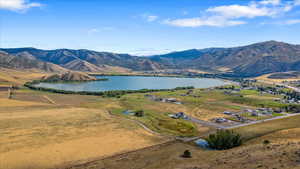 Mountain view featuring a rural view and a water view