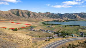 Aerial view with a water and mountain view