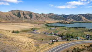 Exterior space featuring a rural view and a water and mountain view