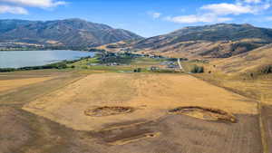 Mountain view with a rural view and a water view