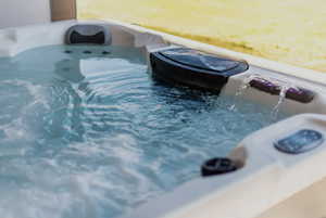 Hot tub on patio at walk-out basement