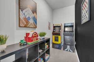 Game room with chalkboard wall