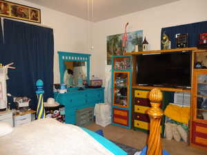 Bedroom featuring carpet flooring