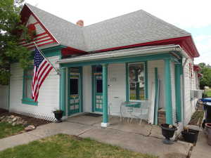 Exterior space featuring covered porch