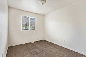 View of carpeted empty room