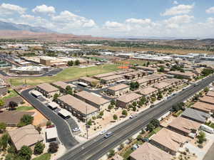 Drone / aerial view of subdivision and area with a mountain view in background