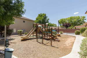 View of playground with trees and xeriscape