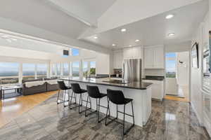 Open floor plan with kitchen, great room and family room