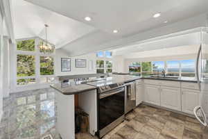 Open floor plan with kitchen, great room and family room