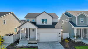 View of front of property with a garage