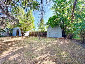 Storage sheds.  Large yard.