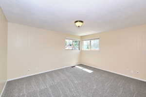 Main Floor Bedroom with Built-Ins and Double Closets (NEW Carpet)