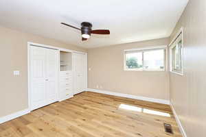 Main Floor Bedroom with New LVP Flooring and Double Closets