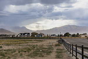 Property view of mountains with a rural view