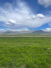 Property view of mountains featuring a rural view