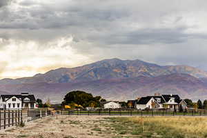 Property view of mountains featuring a rural view