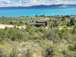 Birds eye view of property featuring a mountain view