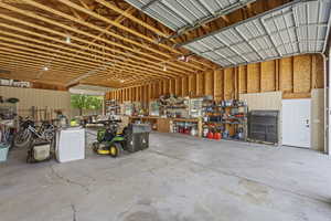 Garage featuring a workshop area