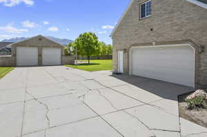 Garage with a lawn and a mountain view