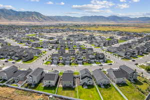 Birds eye view of property with a mountain view