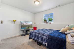 View of carpeted bedroom