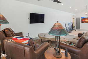 Living room featuring vaulted ceiling