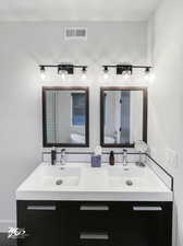 Bathroom featuring vanity