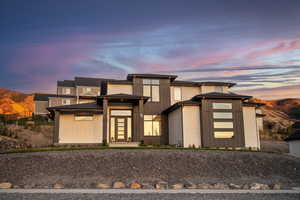 Prairie-style house featuring a mountain view